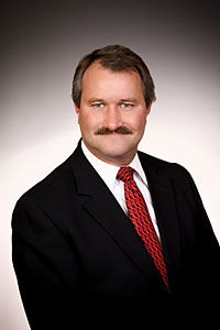 MARTIN J. KAMPRATH